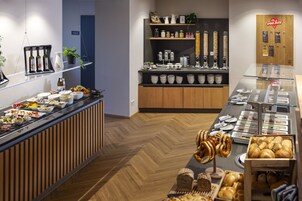 Daily buffet breakfast (EUR 21 per person)