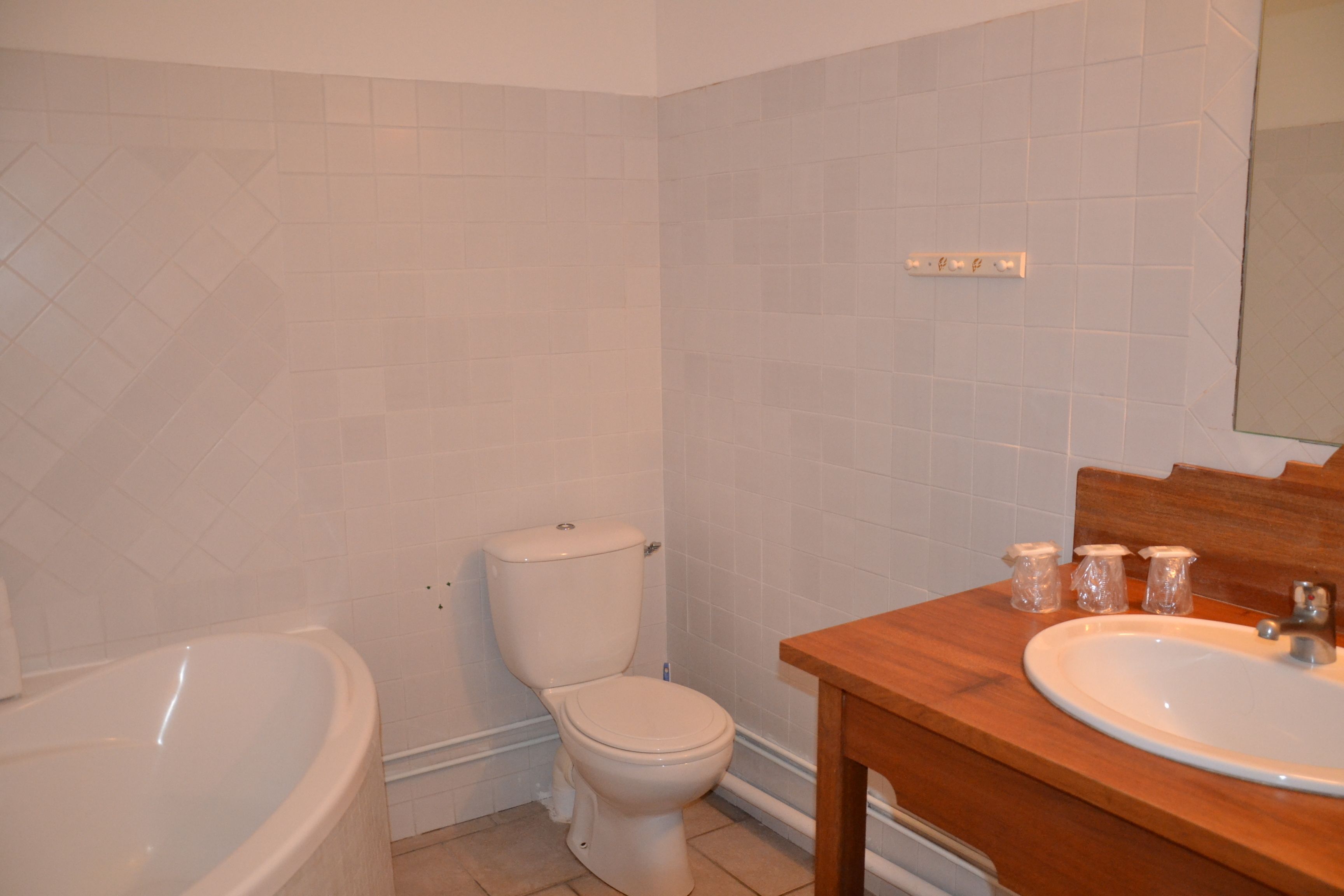 superior triple room | bathroom | hair dryer, towels