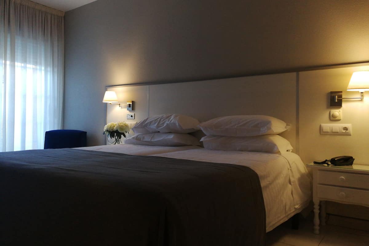 Memory foam beds, minibar, in-room safe, desk