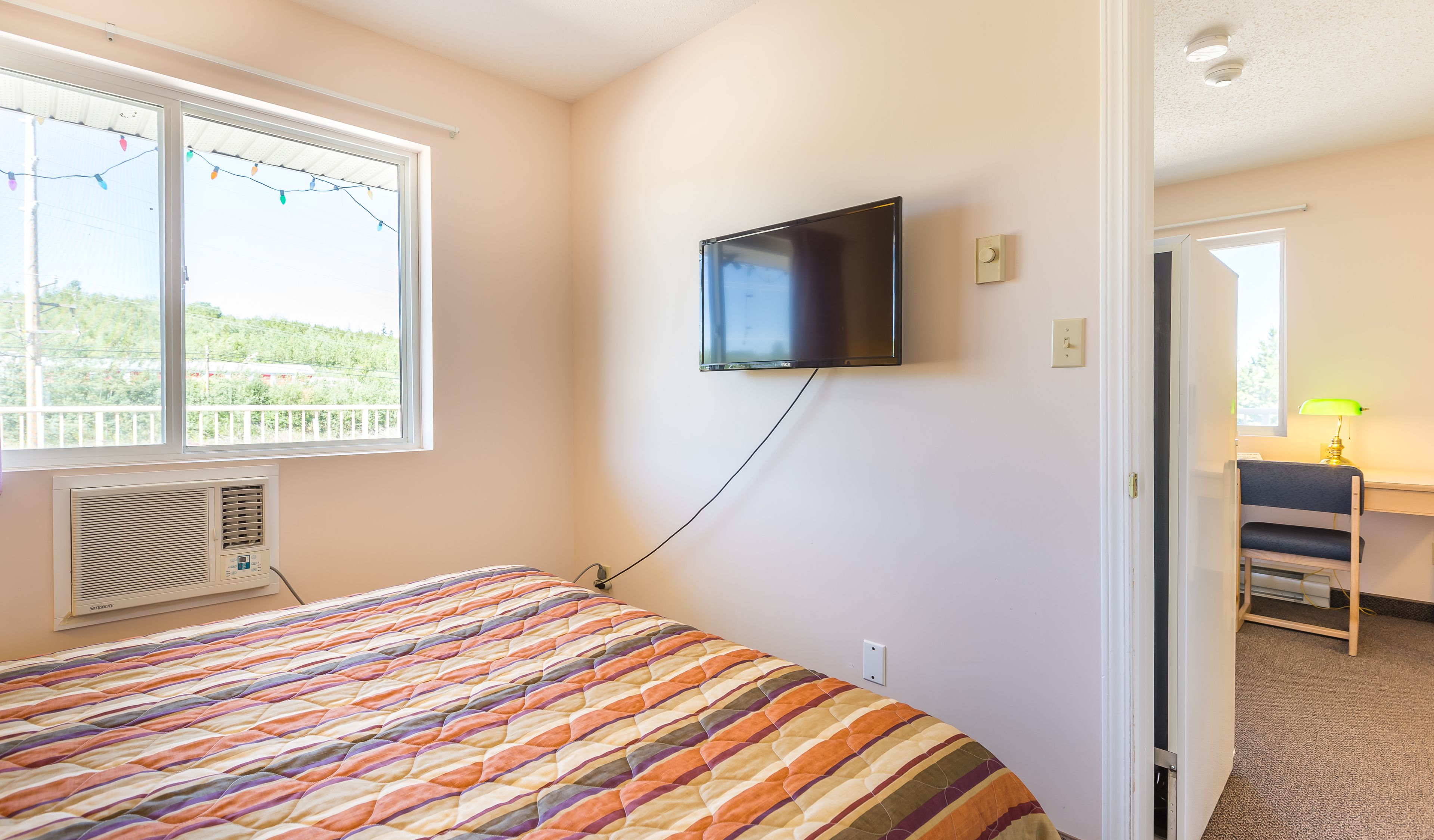 desk, blackout curtains, iron/ironing board, free cots/infant beds