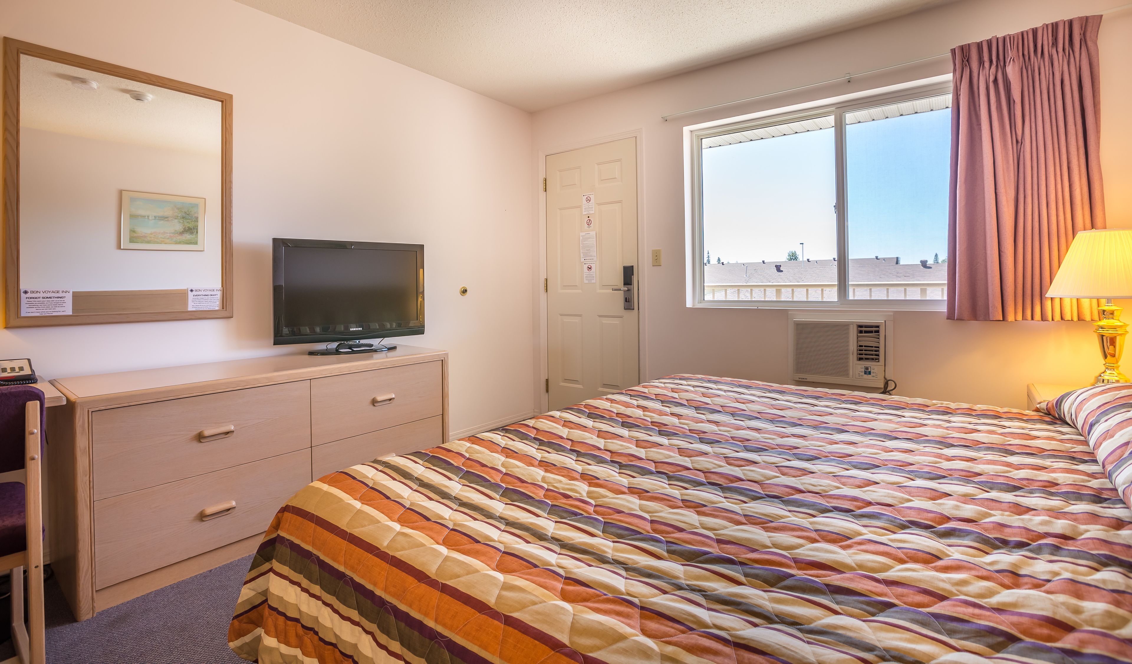 desk, blackout curtains, iron/ironing board, free cots/infant beds