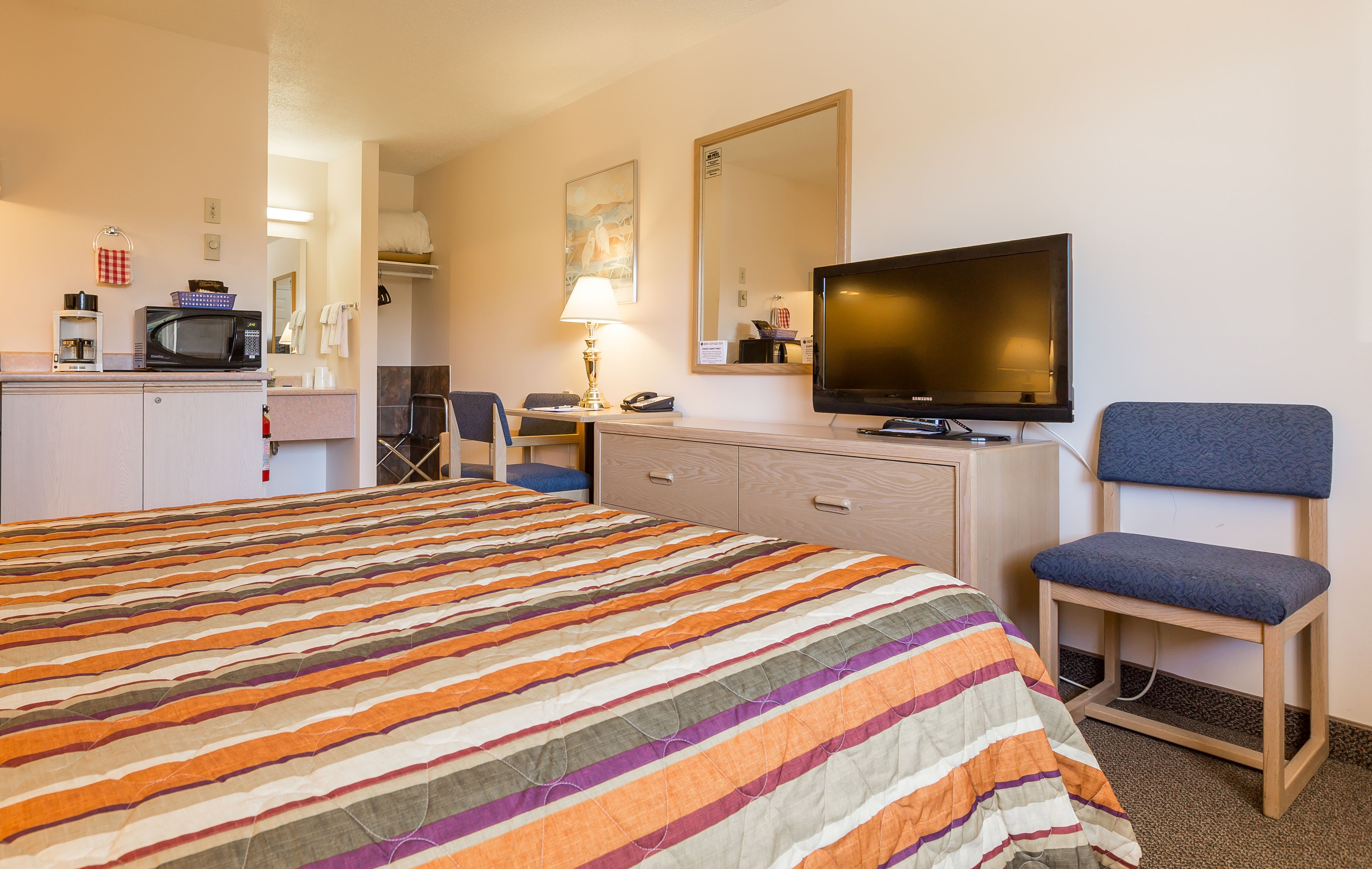 desk, blackout curtains, iron/ironing board, free cots/infant beds