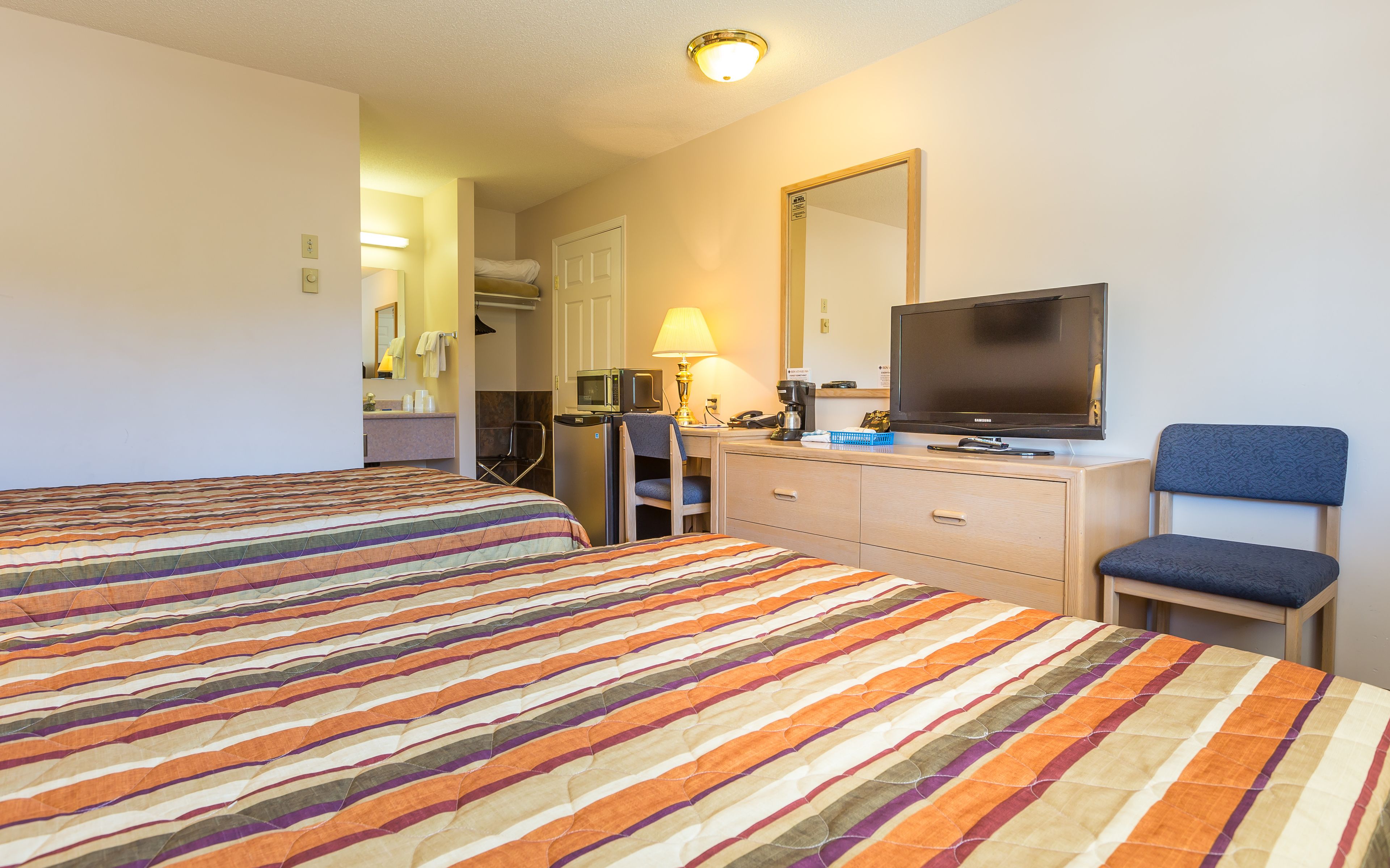 desk, blackout curtains, iron/ironing board, free cots/infant beds