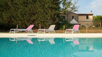 Outdoor pool, pool umbrellas, pool loungers