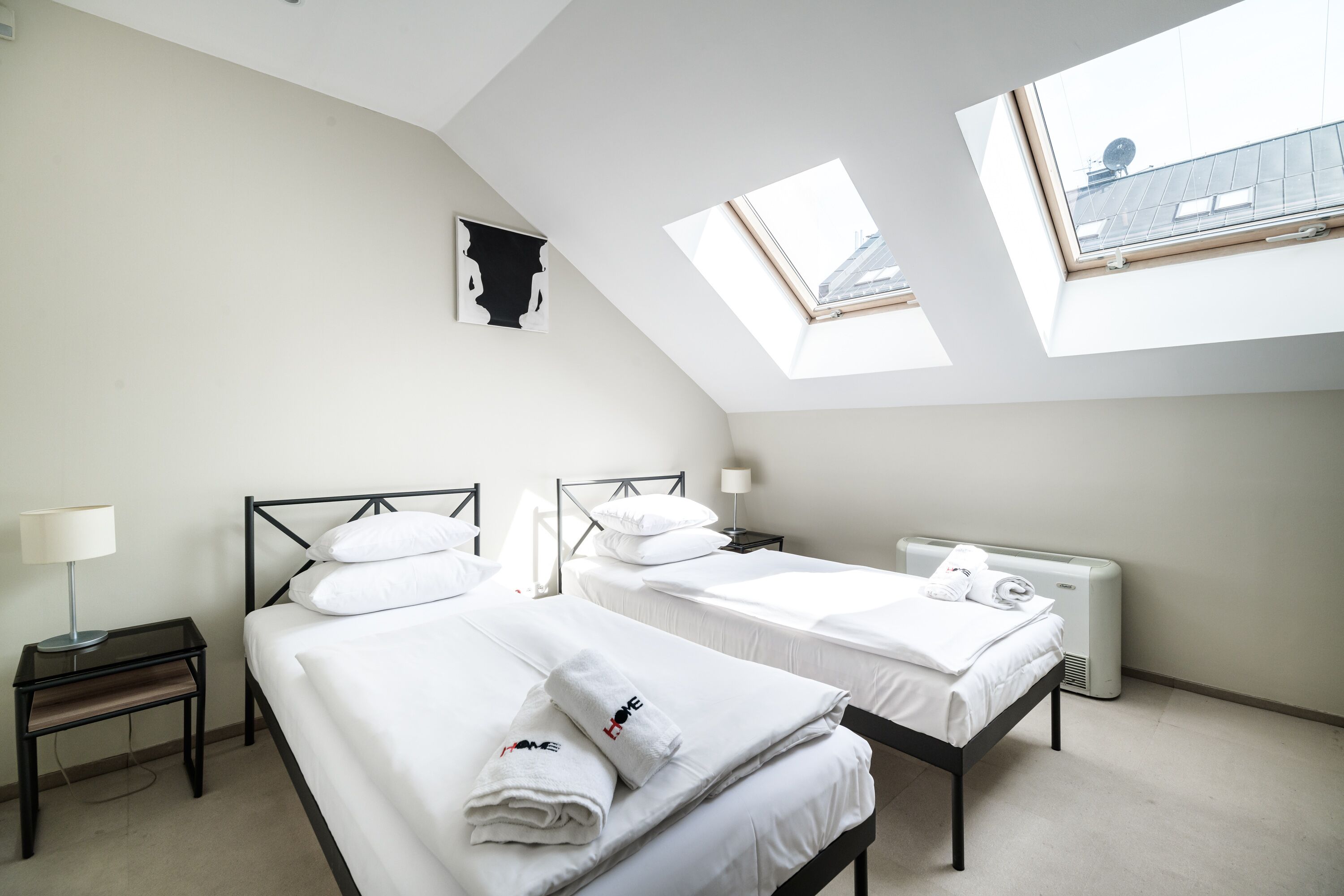 deluxe twin room | living area | 40-cm tv with satellite channels