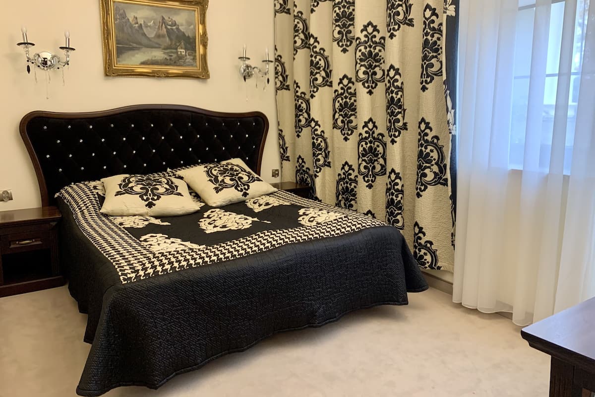 Deluxe-Suite, 1 King-Bett, Nichtraucher, Parkblick | Zimmersafe, Verdunkelungsvorhänge, Bügeleisen/Bügelbrett