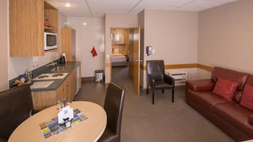 Premium bedding, desk, blackout curtains, iron/ironing board