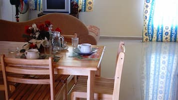 Standard Apartment, 1 Bedroom | Living area | 32-inch LCD TV with digital channels, TV
