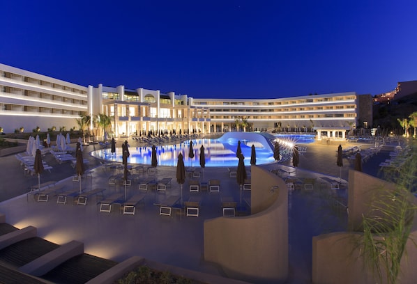 Indoor pool, outdoor pool, open 10:00 AM to 6:00 PM, pool umbrellas