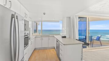 2 Bedroom Standard Apartment with Aircon & Ocean Views | Private kitchen | Full-sized fridge, microwave, stovetop, dishwasher
