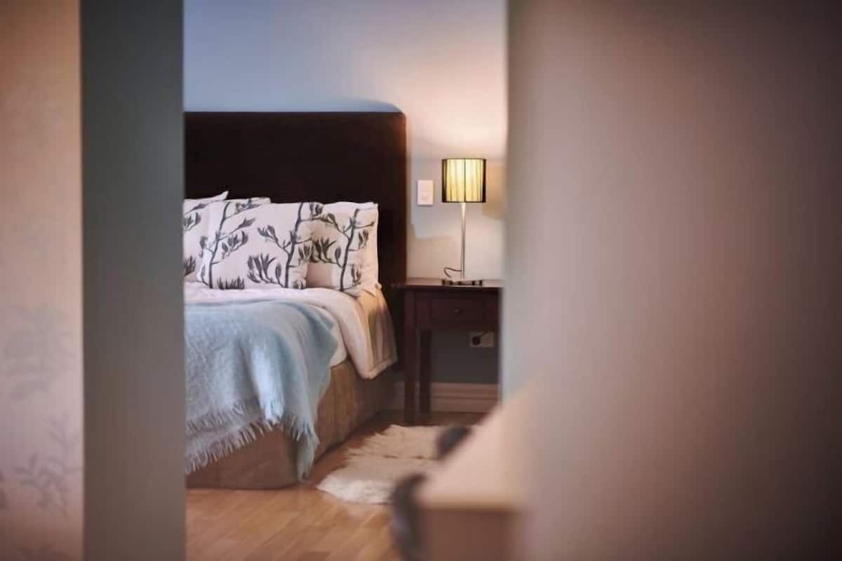 Premium bedding, blackout drapes, soundproofing, iron/ironing board