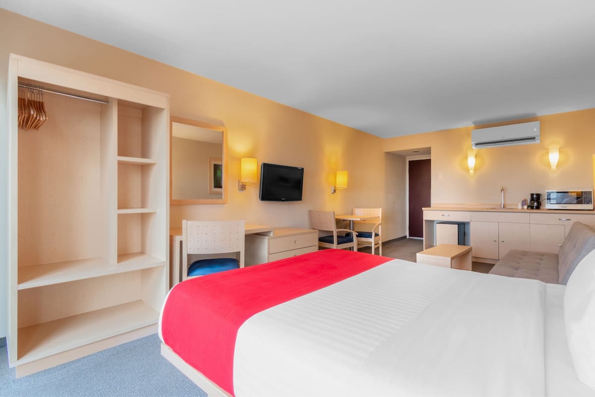 suite, 1 queen bed with sofa bed | 1 bedroom, down duvets, desk, laptop workspace