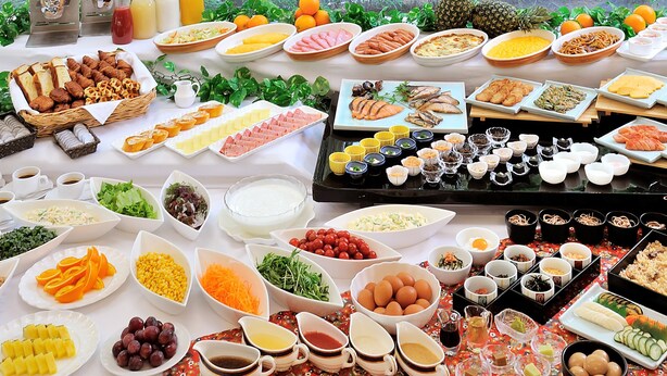 A buffet table with various food items and condiments. - Hotel Crown Palais Kitakyushu (Kitakyushu)