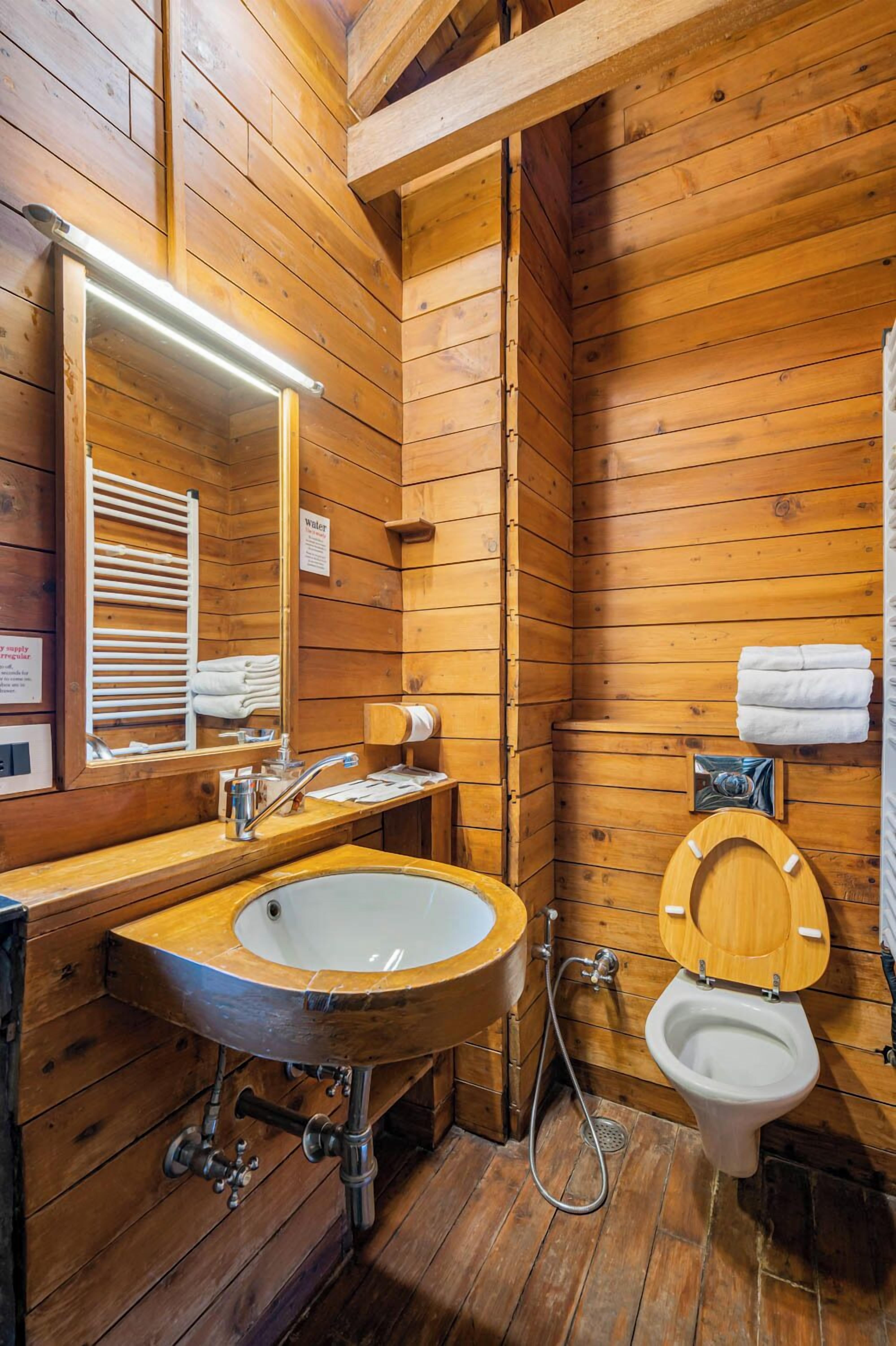 deluxe villa | bathroom | shower, rainfall showerhead, free toiletries, hair dryer