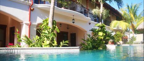 Outdoor pool, pool umbrellas, sun loungers