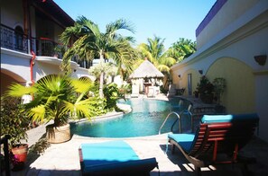 Outdoor pool, pool umbrellas, sun loungers