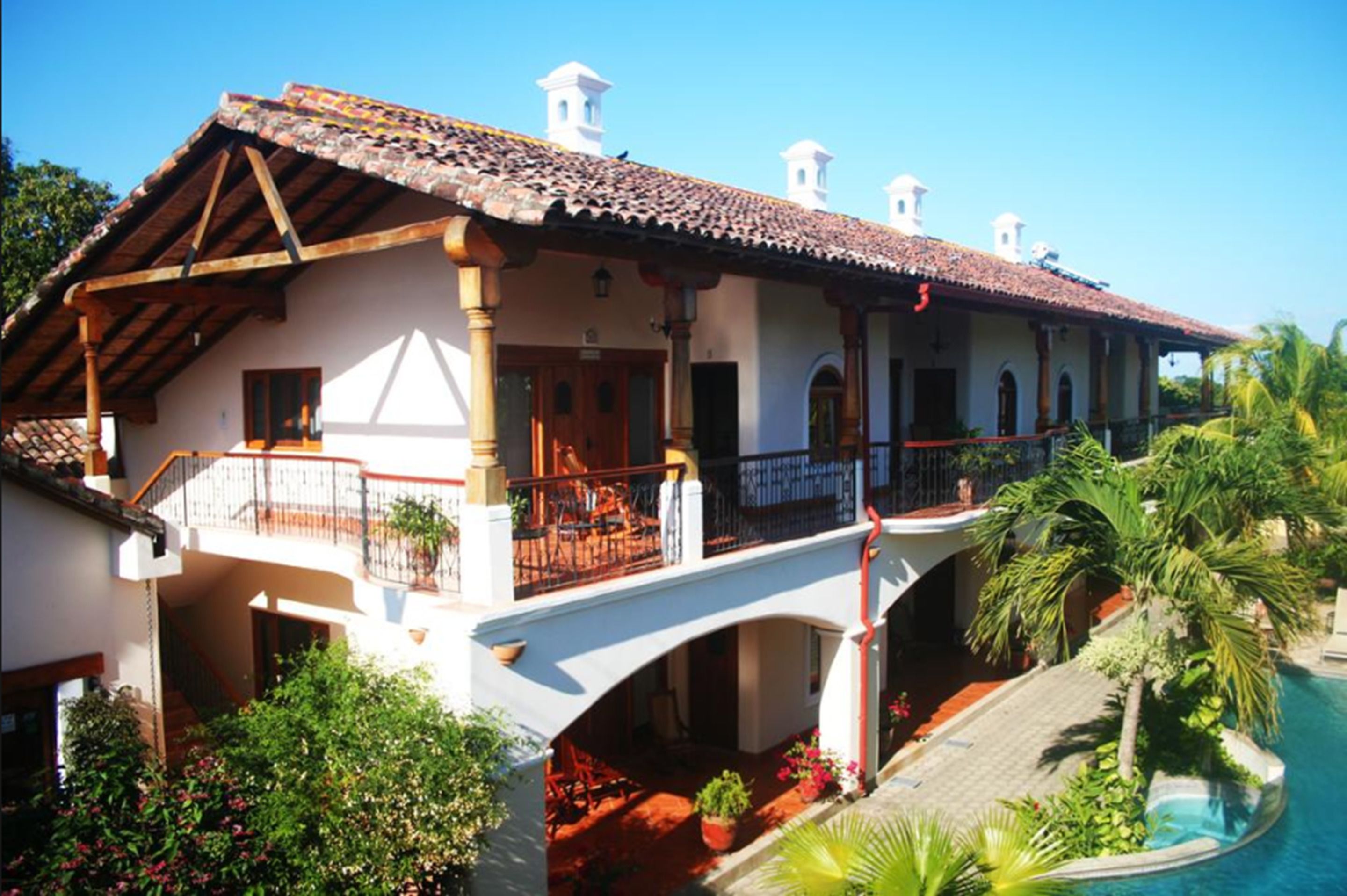 outdoor pool, pool umbrellas, pool loungers