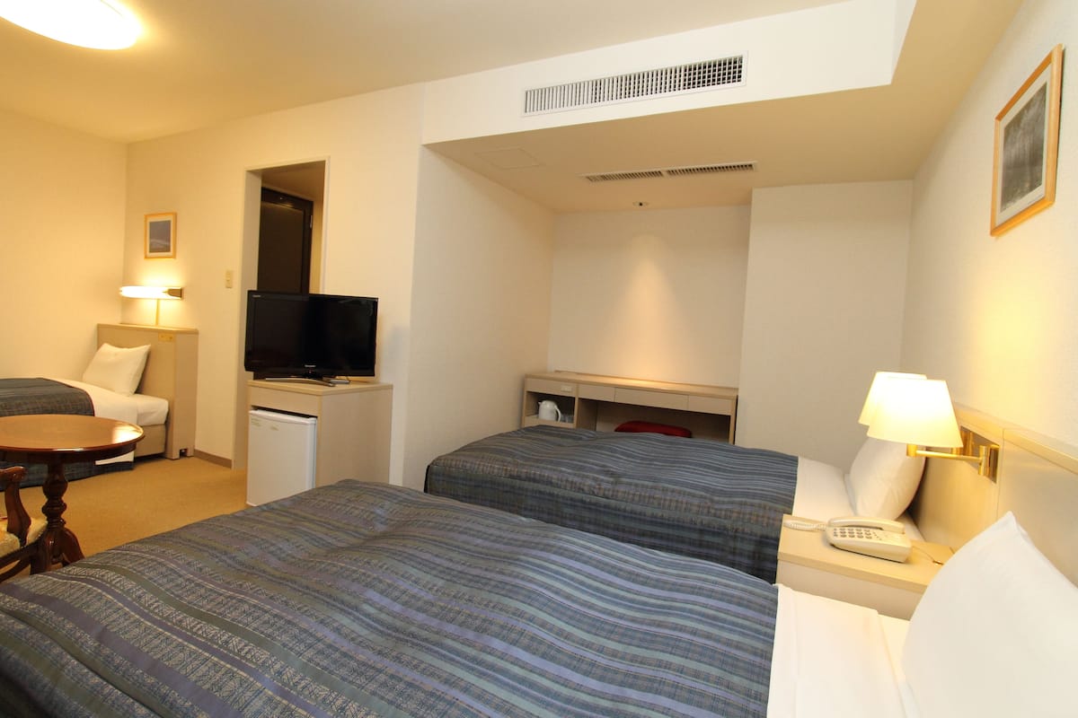 Desk, blackout drapes, iron/ironing board (on request), WiFi (free)