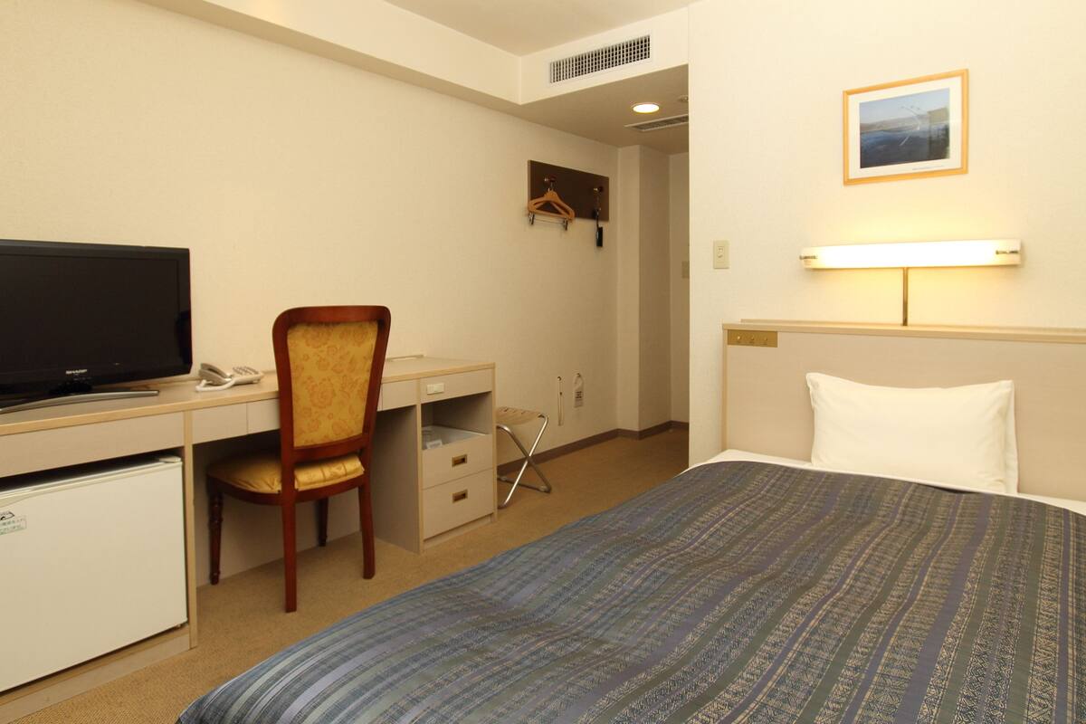 Desk, blackout drapes, iron/ironing board (on request), WiFi (free)
