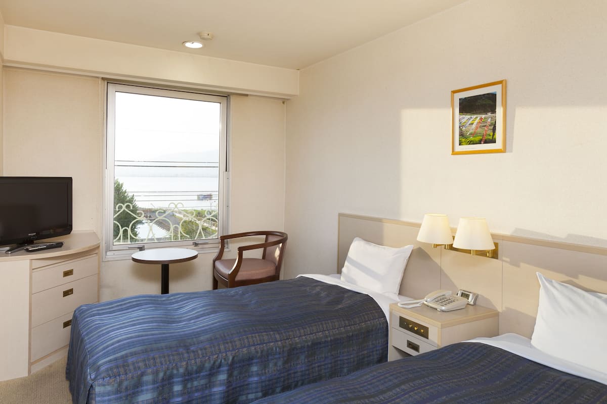 Desk, blackout drapes, iron/ironing board (on request), WiFi (free)