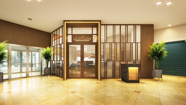 A hotel lobby with a reception desk, glass doors, and a staircase. - Crowne Plaza - ANA Hamamatsu by IHG (Hamamatsu)