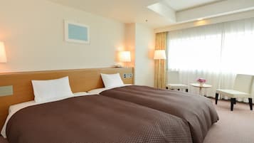 Down comforters, desk, blackout drapes, iron/ironing board