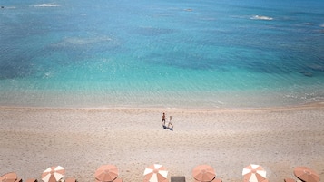 Private beach, sun loungers, beach umbrellas, beach towels