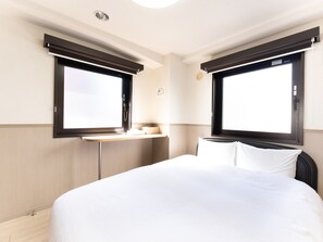 Standard Double Room, Non Smoking | Down comforters, blackout drapes, free WiFi, bed sheets - Tabist Changtee Hotel (Tokyo)