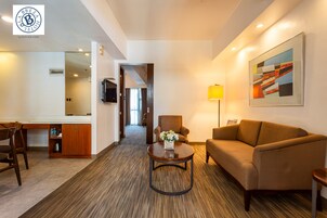 Suite, 1 Bedroom | Living area | LCD TV