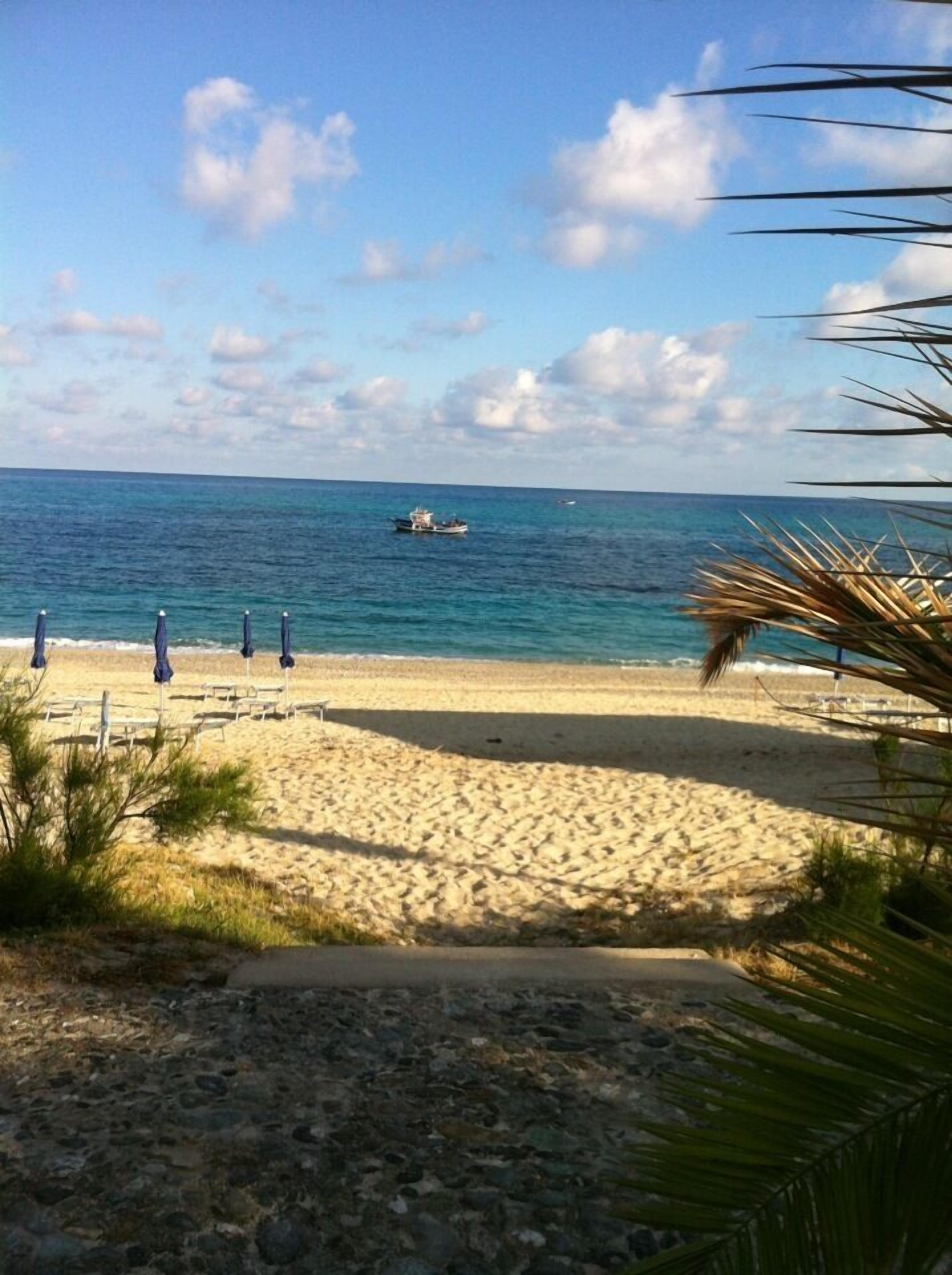 On the beach, waterskiing