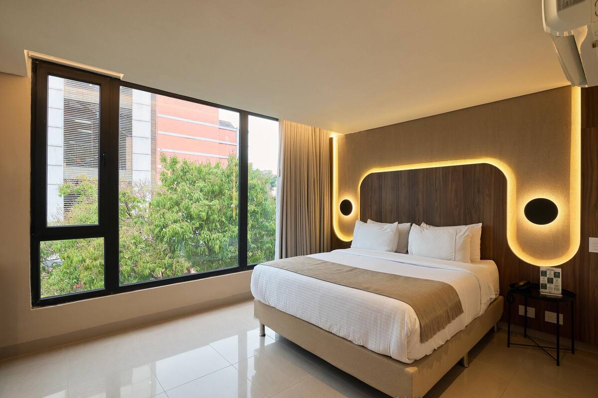 Premium bedding, down comforters, Select Comfort beds, in-room safe