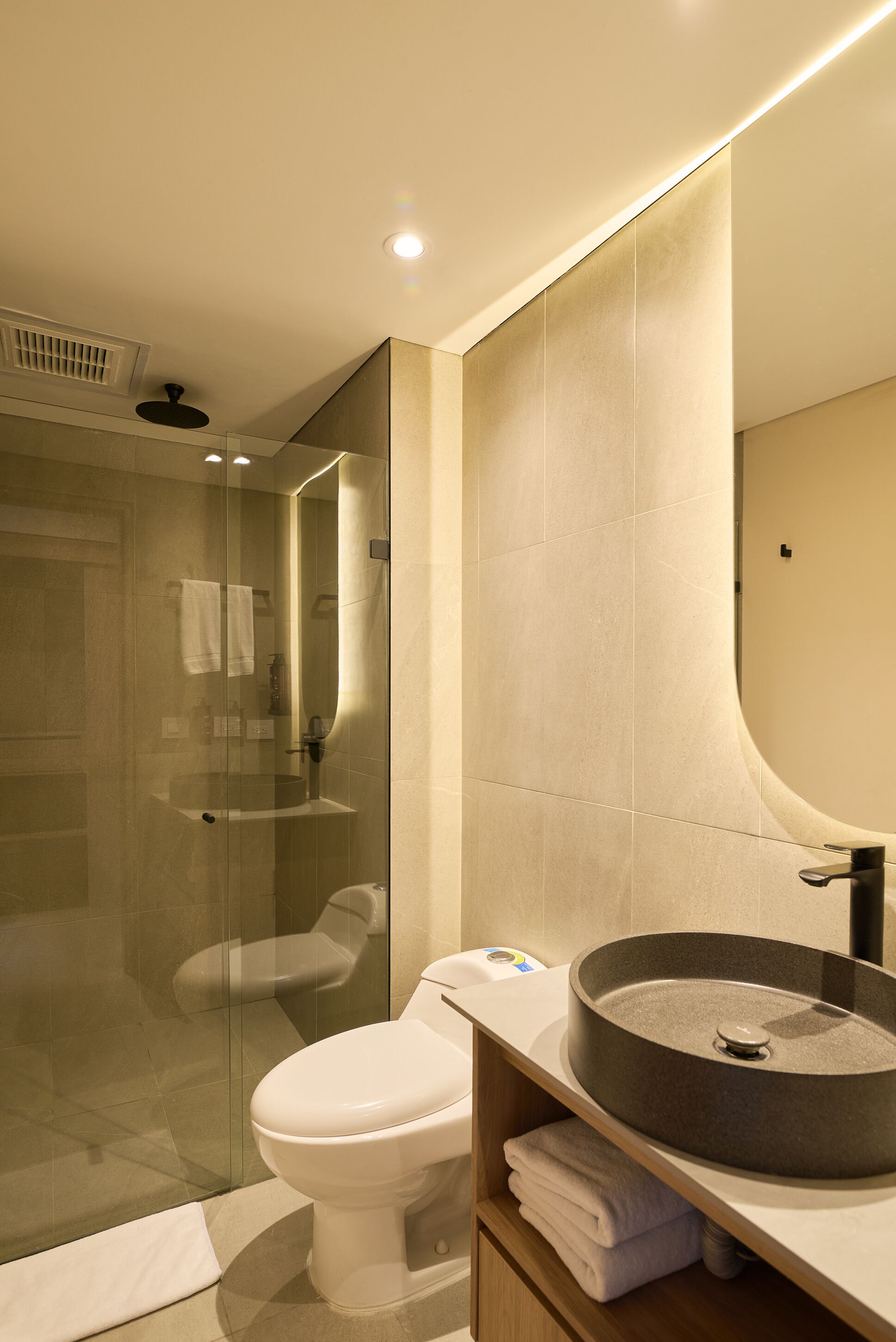 shower, rainfall showerhead, hair dryer, towels