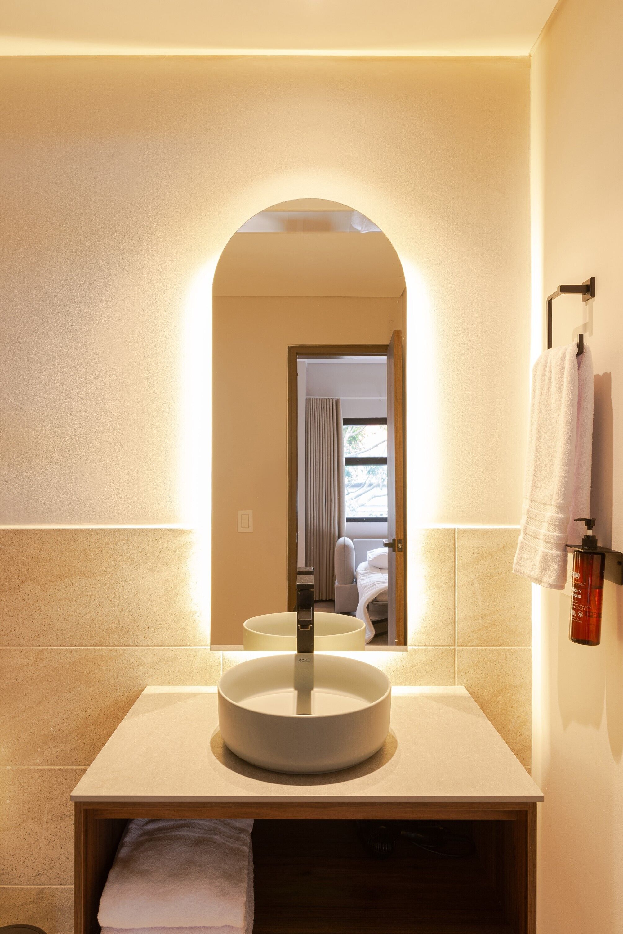 deluxe studio suite, 1 queen bed with sofa bed | bathroom | shower, rainfall showerhead, hair dryer, towels