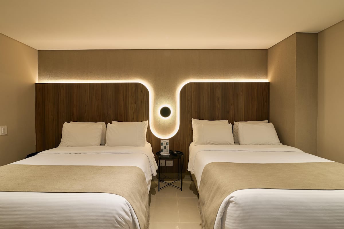 Premium bedding, down duvets, Select Comfort beds, in-room safe
