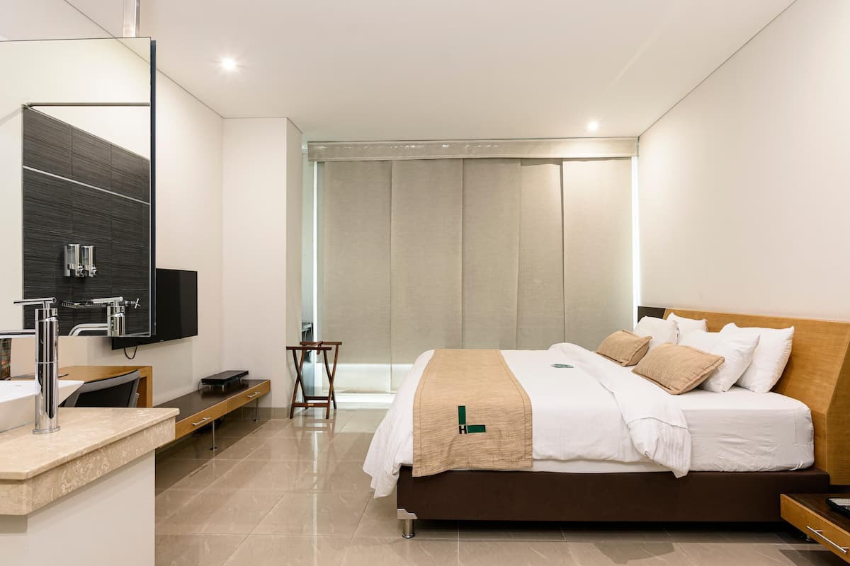 Premium bedding, down duvets, Select Comfort beds, in-room safe