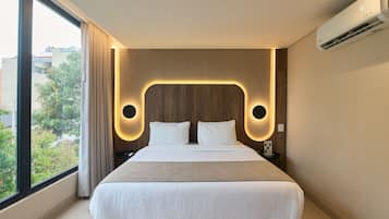 Premium bedding, down comforters, Select Comfort beds, in-room safe