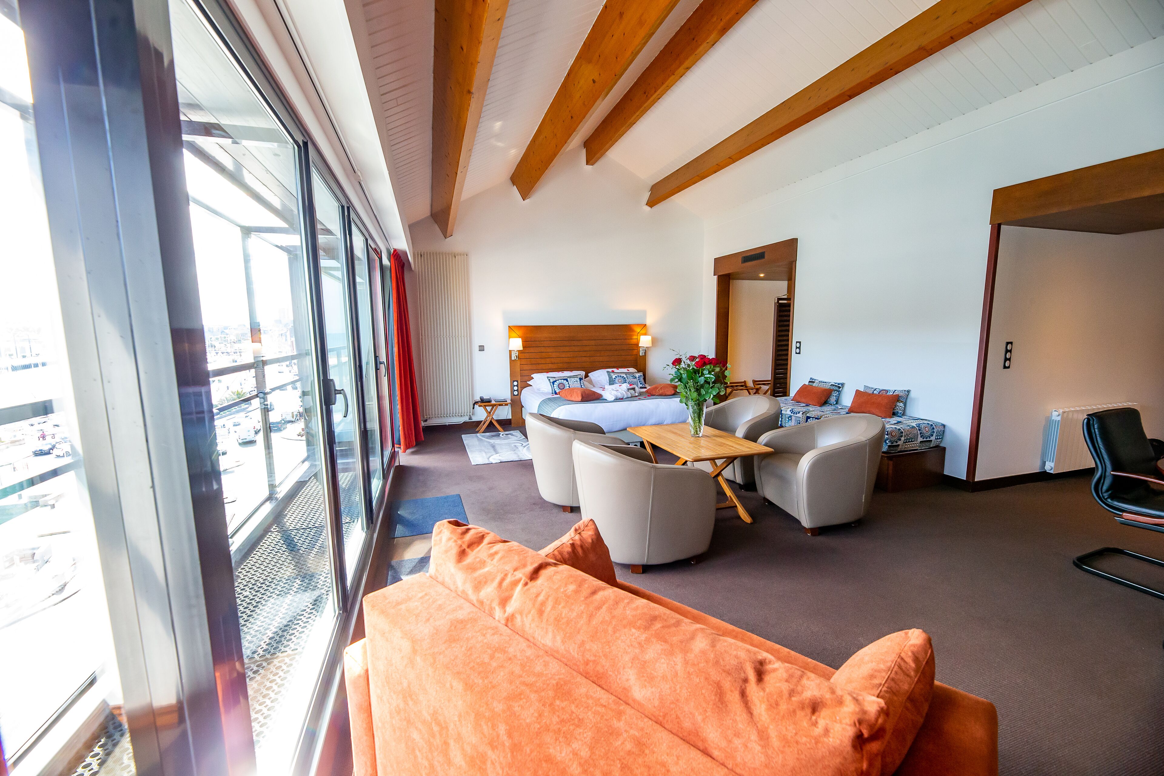 deluxe suite, multiple beds, sea view | premium bedding, free minibar, in-room safe, blackout curtains