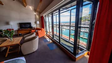Deluxe Suite, Multiple Beds, Sea View | Premium bedding, free minibar, in-room safe, blackout drapes