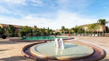 Seasonal outdoor pool, open 10:00 AM to 8:00 PM, pool umbrellas