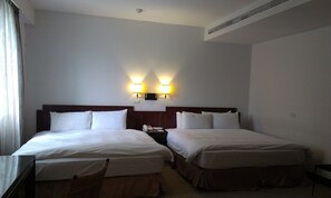 Deluxe Quadruple Room, 2 Double Beds | Premium bedding, down comforters, pillowtop beds, minibar