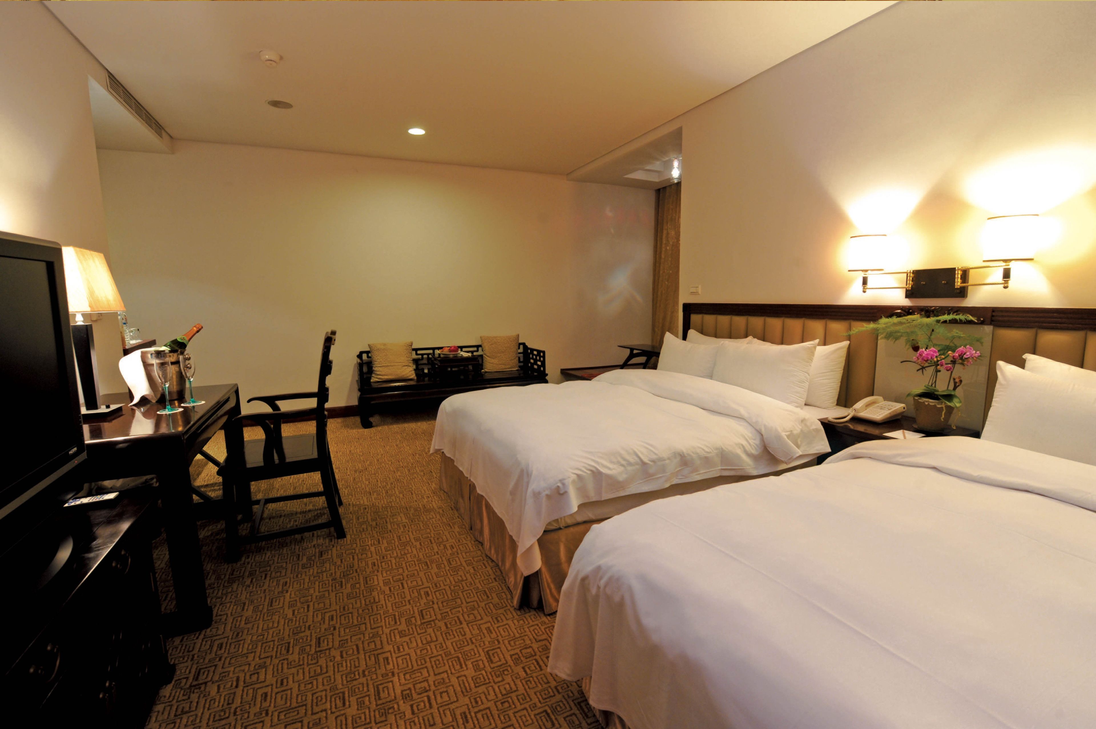 deluxe quadruple room, 2 double beds | premium bedding, down duvets, pillow-top beds, minibar