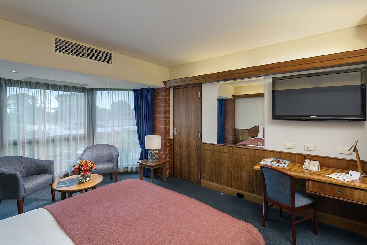 Premium bedding, pillowtop beds, desk, blackout drapes