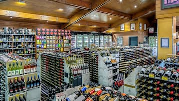 A large liquor store with multiple aisles of wine and spirits.
