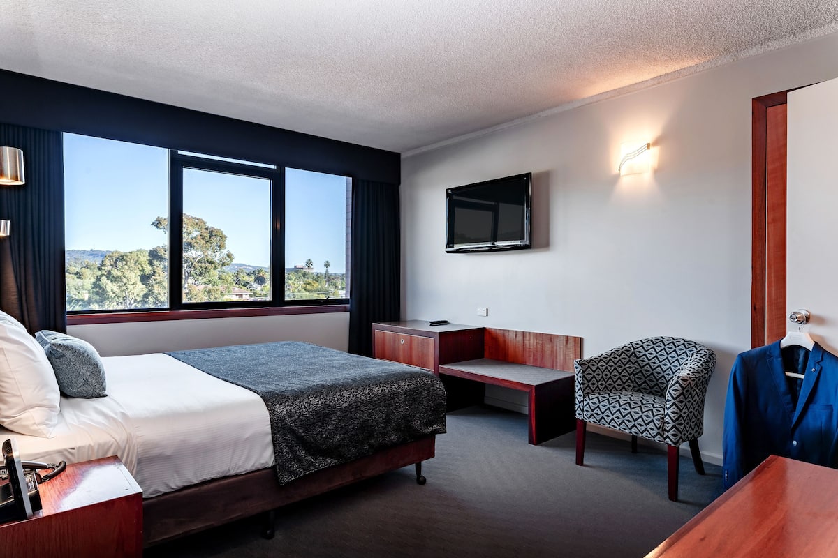 Premium bedding, pillowtop beds, desk, blackout drapes