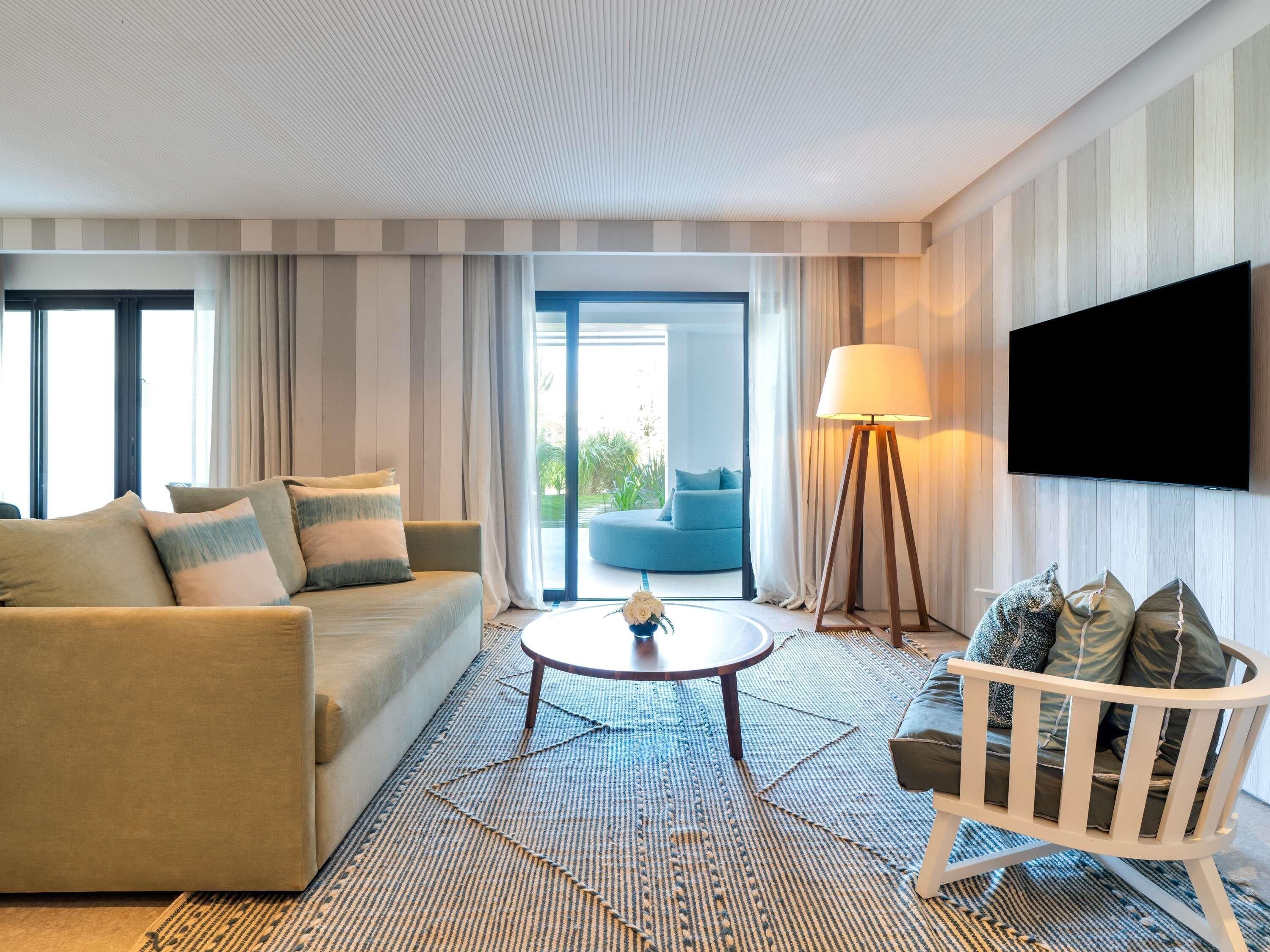 junior suite, 1 king bed, terrace, garden view | premium bedding, in-room safe, desk, laptop workspace