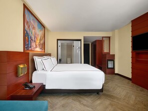Habitación superior, 1 cama King size | Ropa de cama de alta calidad y caja de seguridad en la habitación 