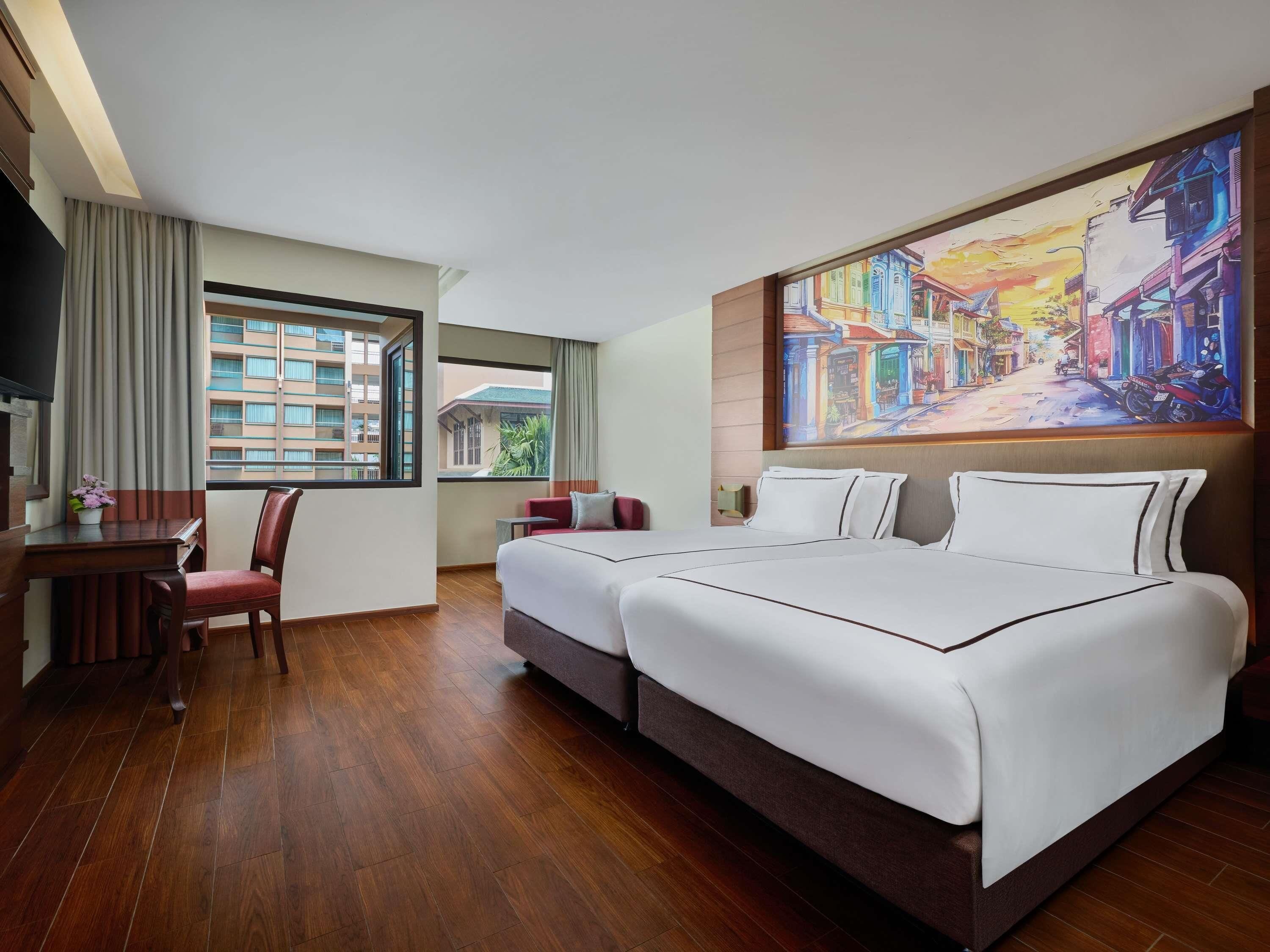 Deluxe kamer, 2 eenpersoonsbedden | Luxe beddengoed, een kluis op de kamer, individueel gedecoreerd