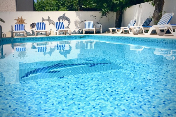 Seasonal outdoor pool, open 9:30 AM to 7:00 PM, sun loungers