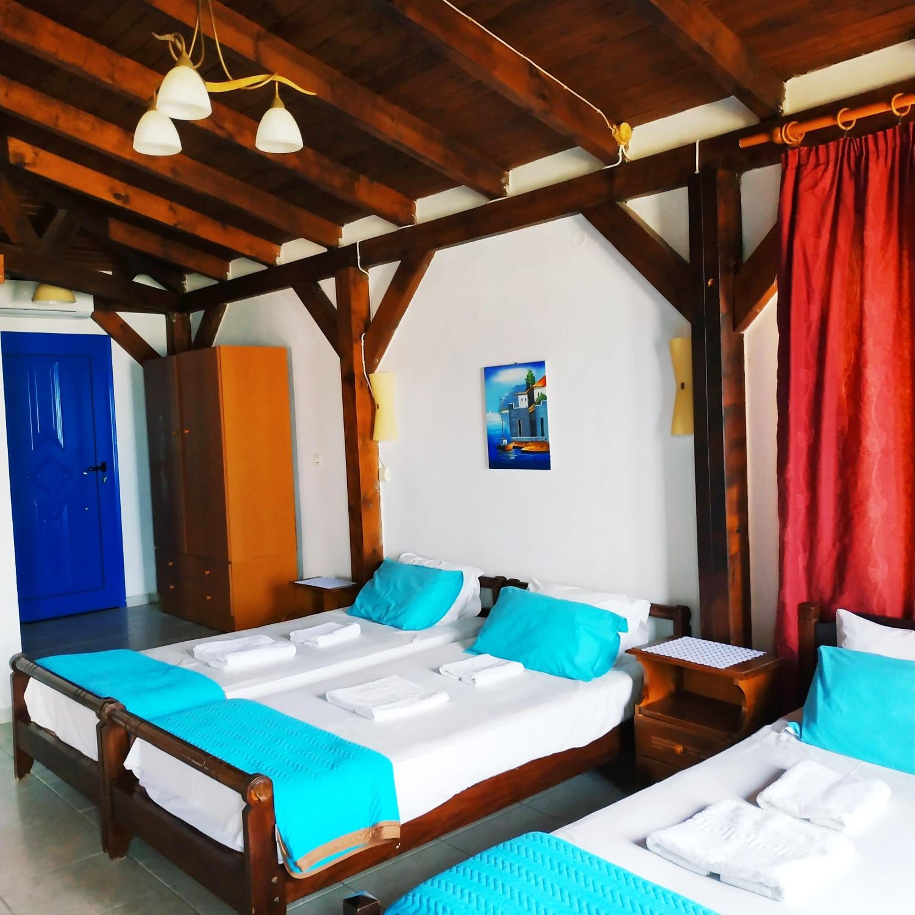 desk, blackout curtains, iron/ironing board, free cots/infant beds