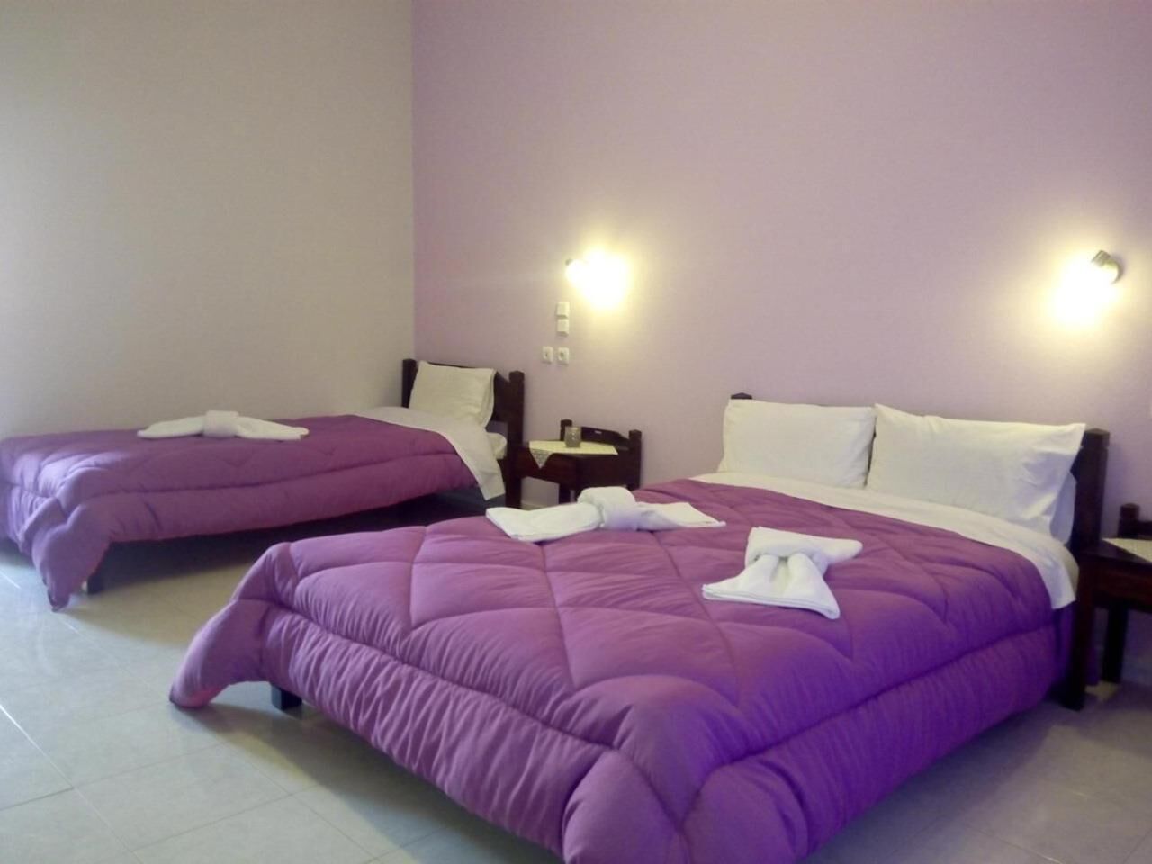 basic triple room, 3 single beds | desk, blackout curtains, iron/ironing board, free cots/infant beds